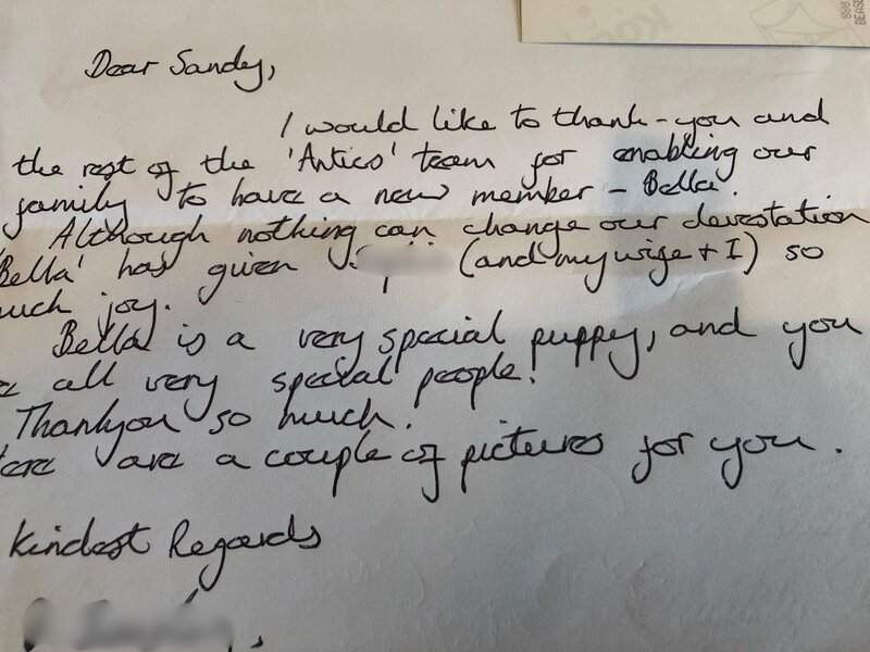 Handwritten note from dad about their puppy, Bella